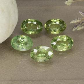 0.6ct Oval Facet Golden Green Demantoid Garnet for sale thumb image of 0.6ct Oval Facet Golden Green Demantoid Garnet (ID: 478451)