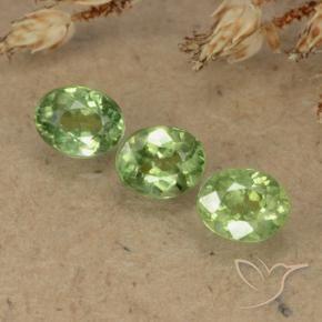 0.86 ctw Green Demantoid Garnet Stones, Natural Demantoid Garnet in Oval Facet Shape for Sale