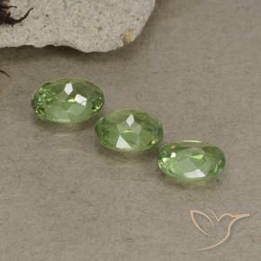 Demantoid Garnet Gemstones in 5.3 x 4.1 mm Size for Sale, Demantoid Garnet Stones in Warm Green Color