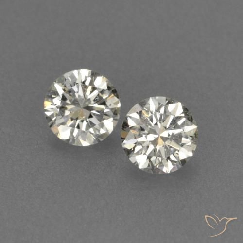 0.14ctw Natural J Diamond, Round, VVS-VS