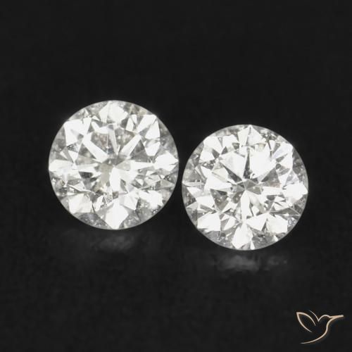 0.04ctw Natural H Diamond, Round, VS