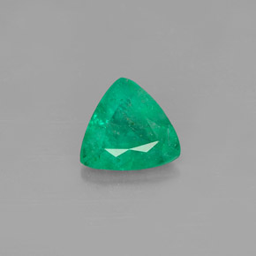 0.61 ct Green Emerald Gemstone, Emerald Gem in Trillion Facet Shape for Sale.