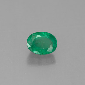 0.56 ct Green Emerald Stone, Natural Emerald in Oval Facet Shape for Sale