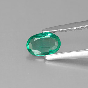 0.39 ct Green Emerald Gemstone, Emerald Gem in Oval Facet Shape for Sale.