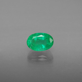 0.58 ct Green Emerald Gemstone, Emerald Gem in Oval Facet Shape for Sale.