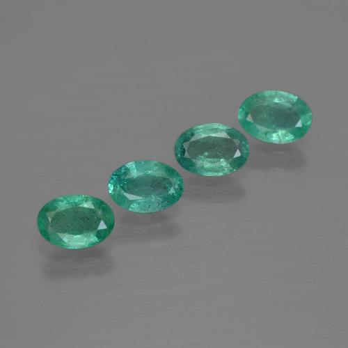 4-teiliges Smaragd / Set - Ovalschliff Grün aus Sambia - Größe 6 x 4,2mm, Gewicht 1,62 ct gesamt / Durchschn. je 0,41 ct, Farbe: Bläulich-grün, Mohs-Härte 7,5 - 8 Geeignet für den täglichen Gebrauch im Schmuck, Sternzeichen Krebs, Photo A