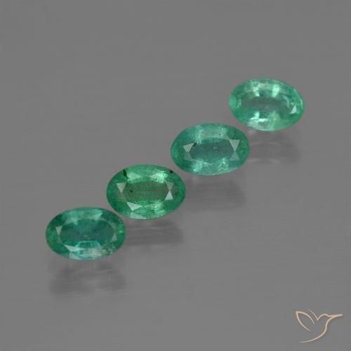 Lot of 4pc Oval Green Emerald from Zambia - Size 6.1 x 4mm, Weight 2.01ct total / avg. 0.5ct each, Color: Bluish Green, Mohs Hardness 7.5 - 8 suitable for daily wear jewelry, Symbolizes Fertility and Re-birth, Photo A