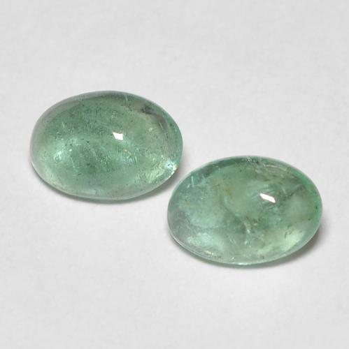 2pc Matching Oval Green Emeralds in Size 5.8 x 4mm, Weight 0.75ct total / avg. 0.38ct each, Light Green in Transparent Clarity, Natural Gemstone, Mohs Hardness 7.5 - 8 suitable for daily wear jewelry, Stone of Successful Love, Photo A