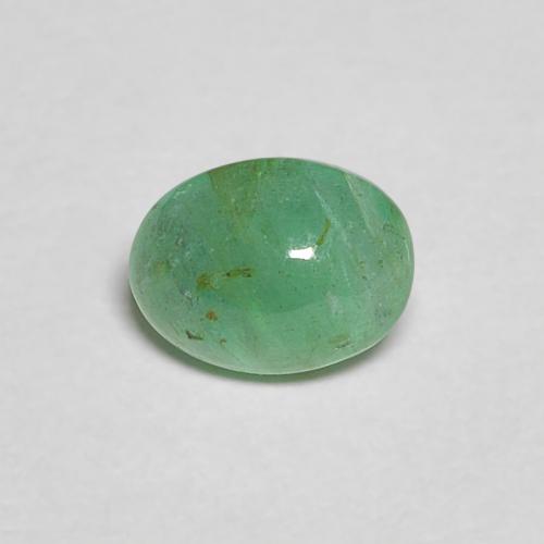 5.1 x 3.9mm Oval Cabochon Green Emerald from Colombia, Weight of 0.39ct, Natural oiled Gemstone in Transparent Clarity, 1pc Emerald - Color: Mint Green, Mohs Hardness of 7.5 - 8 suitable for daily wear jewelry, Symbolizes Fertility and Re-birth, Photo A