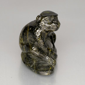 38.79 ct Green Epidote Gemstone, Epidote Gem in Carved Monkey Shape for Sale.