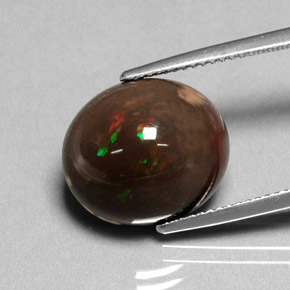7.95 ct Multicolor Fire Opal Gemstone, Fire Opal Gem in Oval Cabochon Shape for Sale.