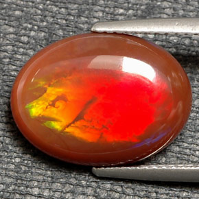 6.21 ct Multicolor Fire Opal Gemstone, Fire Opal Gem in Oval Cabochon Shape for Sale.