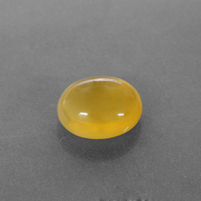 2.44 ct Yellow Fire Opal Gemstone, Fire Opal Gem in Oval Cabochon Shape for Sale.