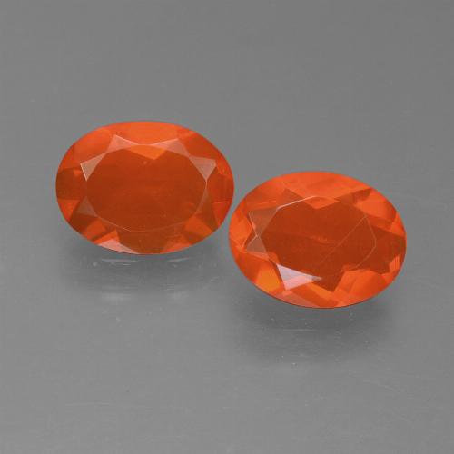 Orange moyen Opale de Feu gemme - 0.6ct Ovale facette (ID: 450554)
