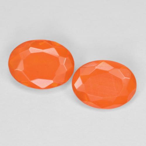 Coppia Opale di fuoco Ovale abbinata 8,1 x 6,1mm - Peso 1,03 ct totali / media. 0,52 ct ciascuno, pietra preziosa naturale non trattati, colore Arancio Intenso in purezza Translucent, durezza Mohs 5,5 - 6,5, Photo A