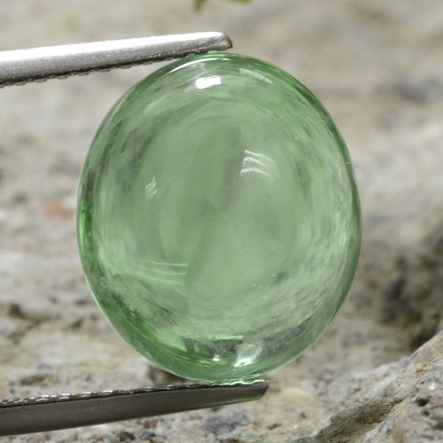 Verde cálido Fluorita Gema - 8.8ct Cabujón Óvalo (ID: 475851)