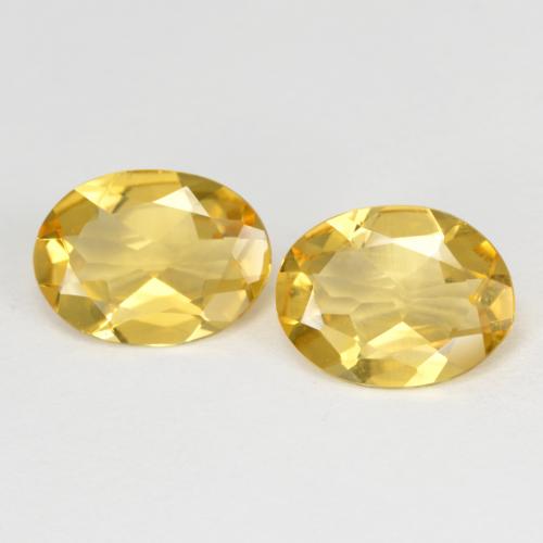 9.2 x 6.8mm Matching Oval Golden Beryl Pair - Weight 2.68ct total / avg. 1.34ct each, Golden Color in VVS-VS Clarity, Natural untreated Gemstone, Mohs Hardness 7.5 - 8 suitable for daily wear jewelry, Photo A
