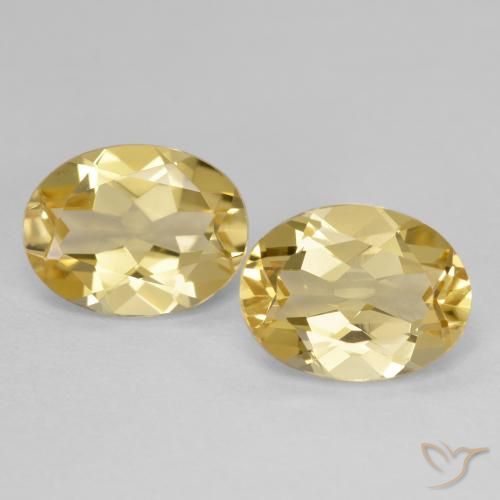Berilo Dorado Ovalada a juego de 2 piezas en tamaño 9,2 x 7mm, peso 3,41 ct en total / promedio. 1,71 ct cada uno, Amarillo dijón en claridad vvs-vs, piedra preciosa natural No tratado, dureza de Mohs 7.5 - 8 Adecuado para joyas de uso diario, Photo A