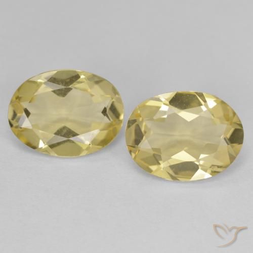Par de Berilo Dorado Ovalada a juego de 9,2 x 7mm - Peso 2,89 ct en total / promedio. 1,45 ct cada uno, color Amarillo medio en claridad vvs-vs, piedra preciosa natural No tratado, dureza de Mohs 7.5 - 8 Adecuado para joyas de uso diario, Photo A