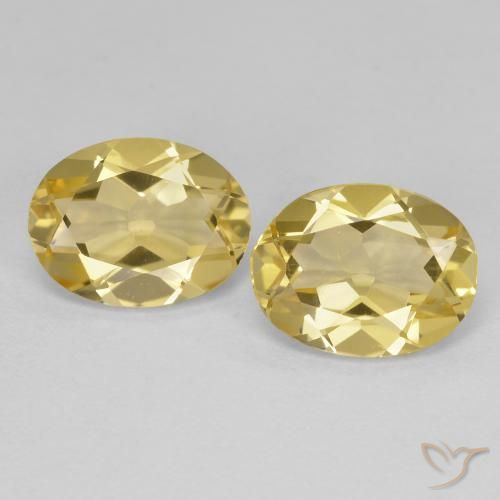 Berilo Dorado Ovalada a juego de 2 piezas en tamaño 9,1 x 6,9mm, peso 3,36 ct en total / promedio. 1,68 ct cada uno, Amarillo claro en claridad VS, piedra preciosa natural No tratado, dureza de Mohs 7.5 - 8 Adecuado para joyas de uso diario, Photo A