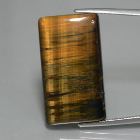 25.2ct Baguette Cabochon Multicolor Hawk's Eye Gem for sale 25.2ct Baguette Cabochon Multicolor Hawk's Eye Gem (ID: 379701)