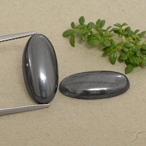 18,1 x 9,1mm Oval Hämatit-Paar - Gewicht 18,45 ct gesamt / durchschnittl. 9,23 ct, Garantiert natürliche Edelsteine, Grau Farbe in Opaque Reinheit, Mohs-Härte 5,5 - 6,5, Photo A