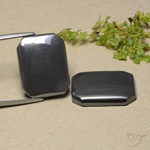 Matching Pair of 19.4 x 15.1mm Octagon Cabochon Gray Hematite, Weight of 34.87ct total / avg. 17.44ct each, Matching Hematite Pair in Opaque Clarity in Black Gray Color, Natural untreated gemstone, Mohs Hardness 5.5 - 6.5, Photo A