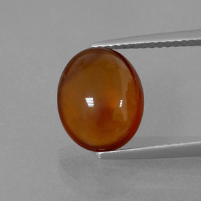 4.85 ct Orange Hessonite Garnet Gemstone, Hessonite Garnet Gem in Oval Cabochon Shape for Sale.