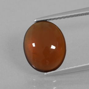 3.7ct Oval Cabochon Orange Hessonite Garnet for sale thumb image of 3.7ct Oval Cabochon Orange Hessonite Garnet (ID: 428147)