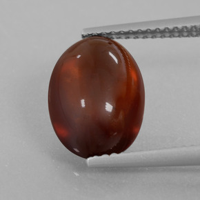 5.65 ct Orange Hessonite Garnet Gemstone, Hessonite Garnet Gem in Oval Cabochon Shape for Sale.