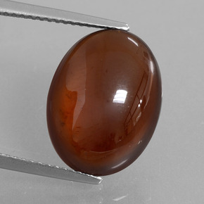 9.81 ct Orange Hessonite Garnet Gemstone, Hessonite Garnet Gem in Oval Cabochon Shape for Sale.