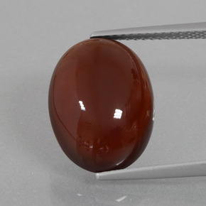 9.76 ct Orange Hessonite Garnet Gemstone, Hessonite Garnet Gem in Oval Cabochon Shape for Sale.