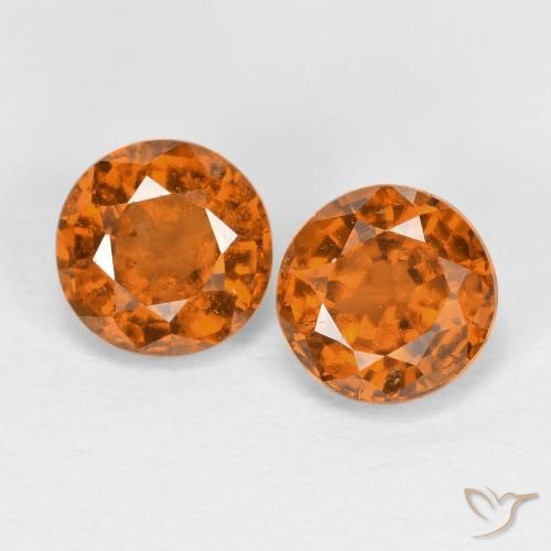 Coppia Granato essonite Rotondo abbinata 5,8mm - Peso 1,79 ct totali / media. 0,9 ct ciascuno, pietra preziosa naturale non trattati, colore Arancio giallastro in purezza VS, durezza Mohs 6,5 - 7,5 adatto per gioielli da indossare ogni giorno, Photo A