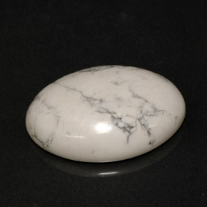 9.54 ct White Howlite Gemstone, Howlite Gem in Oval Cabochon Shape for Sale.