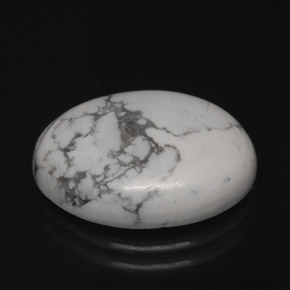 7.62 ct White Howlite Gemstone, Howlite Gem in Oval Cabochon Shape for Sale.
