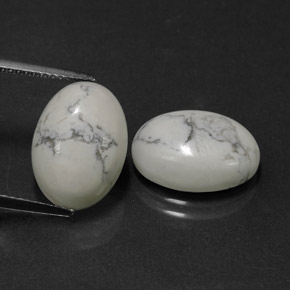 12.28 ct White Howlite Gemstone, Howlite Gem in Oval Cabochon Shape for Sale.