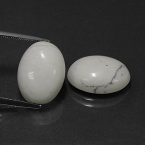 11.09 ct White Howlite Gemstone, Howlite Gem in Oval Cabochon Shape for Sale.