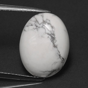7.41 ct White Howlite Gemstone, Howlite Gem in Oval Cabochon Shape for Sale.