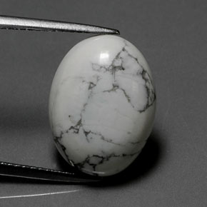 7.88 ct White Howlite Gemstone, Howlite Gem in Oval Facet Shape for Sale.