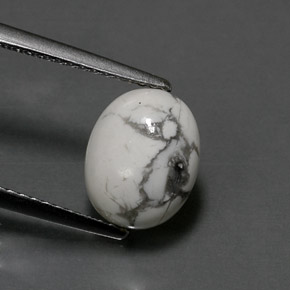 2.48 ct White Howlite Gemstone, Howlite Gem in Oval Cabochon Shape for Sale.