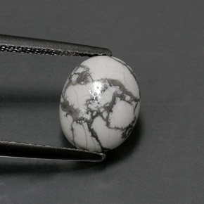 2.36 ct White Howlite Gemstone, Howlite Gem in Oval Cabochon Shape for Sale.