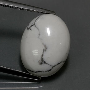 7.17 ct White Howlite Gemstone, Howlite Gem in Oval Cabochon Shape for Sale.