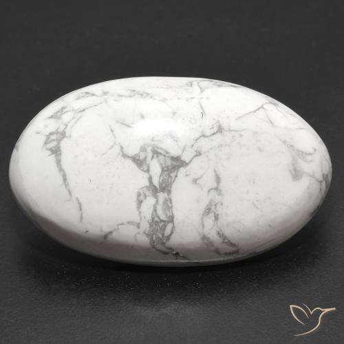 Howlite bianco taglio ovale da 22,94 ct dagli Stati Uniti, dimensione 27,9 x 16,5mm, pietra preziosa naturale non trattati , purezza Opaque, Howlite Ovale cabochon da 1 pz, durezza Mohs di 3 - 3,5, Photo A