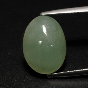 7.63 ct Green Jadeite Stone, Natural Jadeite in Oval Cabochon Shape for Sale