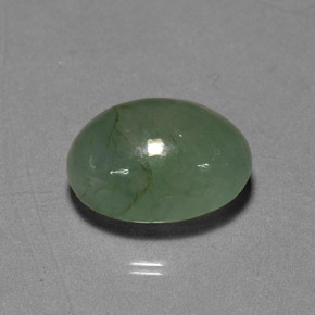 7.24 ct Green Jadeite Gemstone, Jadeite Gem in Oval Cabochon Shape for Sale.
