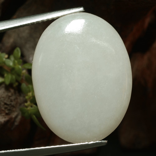 Warm Light Green Jadeite Gem - 15.3ct Oval Cabochon (ID: 382559)