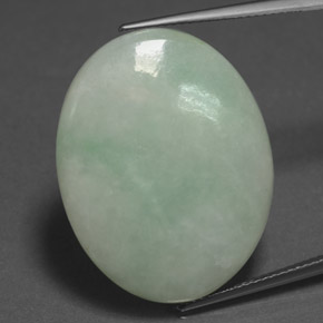 30.33 ct Green Jadeite Gemstone, Jadeite Gem in Oval Cabochon Shape for Sale.