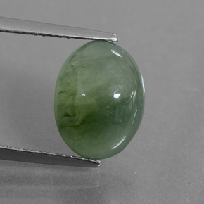 5.99 ct Green Jadeite Gemstone, Jadeite Gem in Oval Cabochon Shape for Sale.