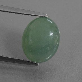 5.60 ct Green Jadeite Gemstone, Jadeite Gem in Oval Cabochon Shape for Sale.