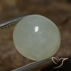 7.41 ct Green Jadeite Stone, Natural Jadeite in Oval Cabochon Shape for Sale
